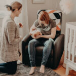 Postnatal doula, Belfast helping new mother with breastfeeding