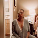 Pregnant woman on birth-ball focusing on her labour